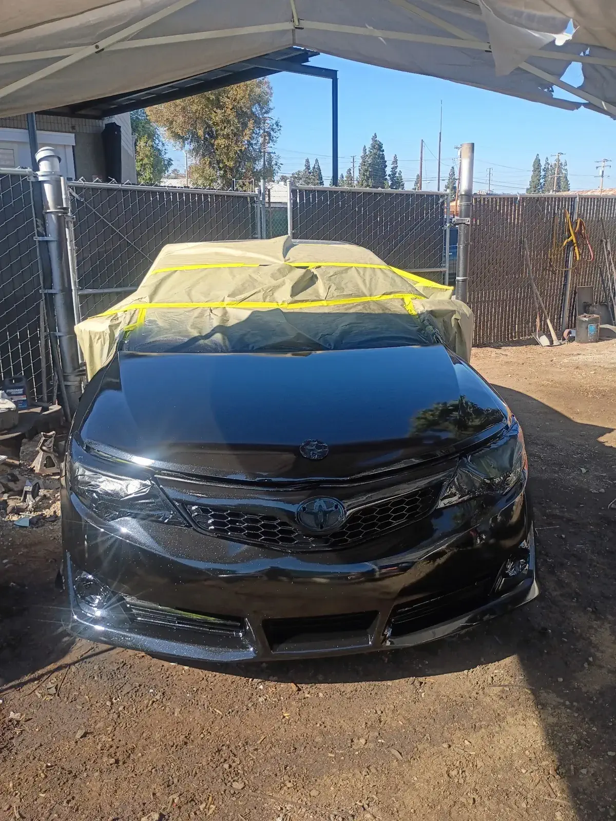 Black Toyota Camry repaired and repainted after collision repair