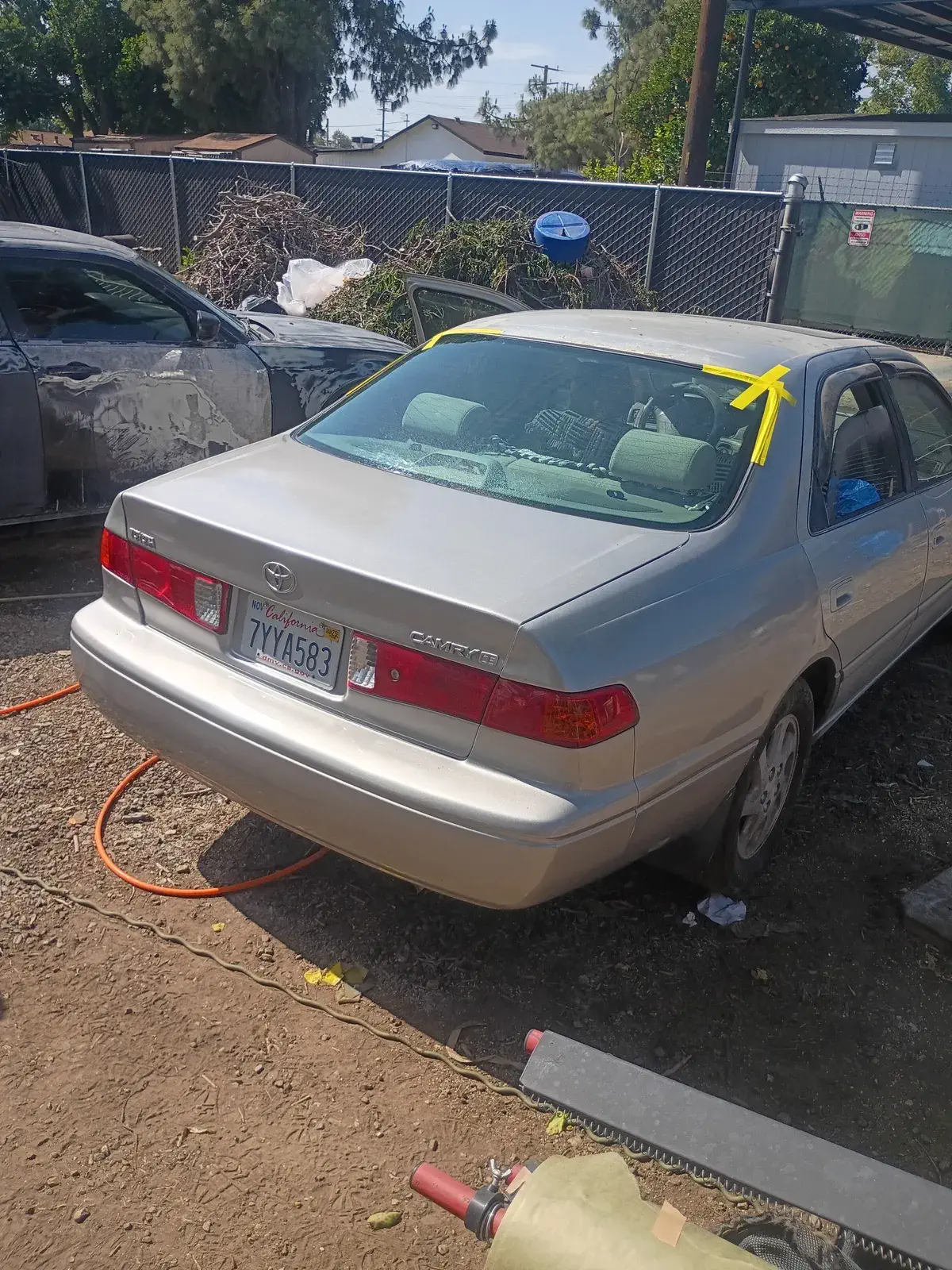 Brown Toyota Camry trunk rebuilt and aligned after auto body repair
